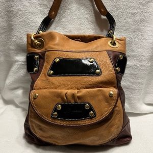 Large leather shoulder bag.